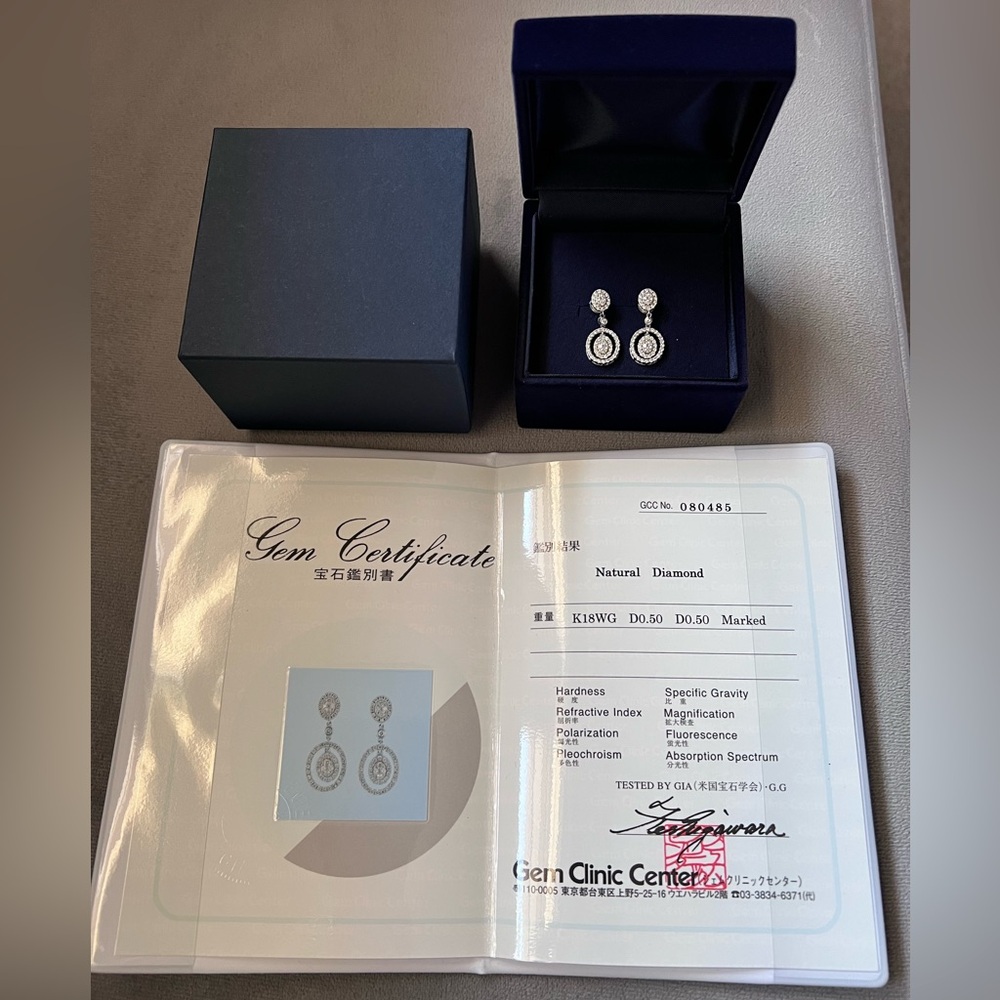 SOLD ✅Authentic WG Diamond Earrings. Used them once and it comes with GIA cert